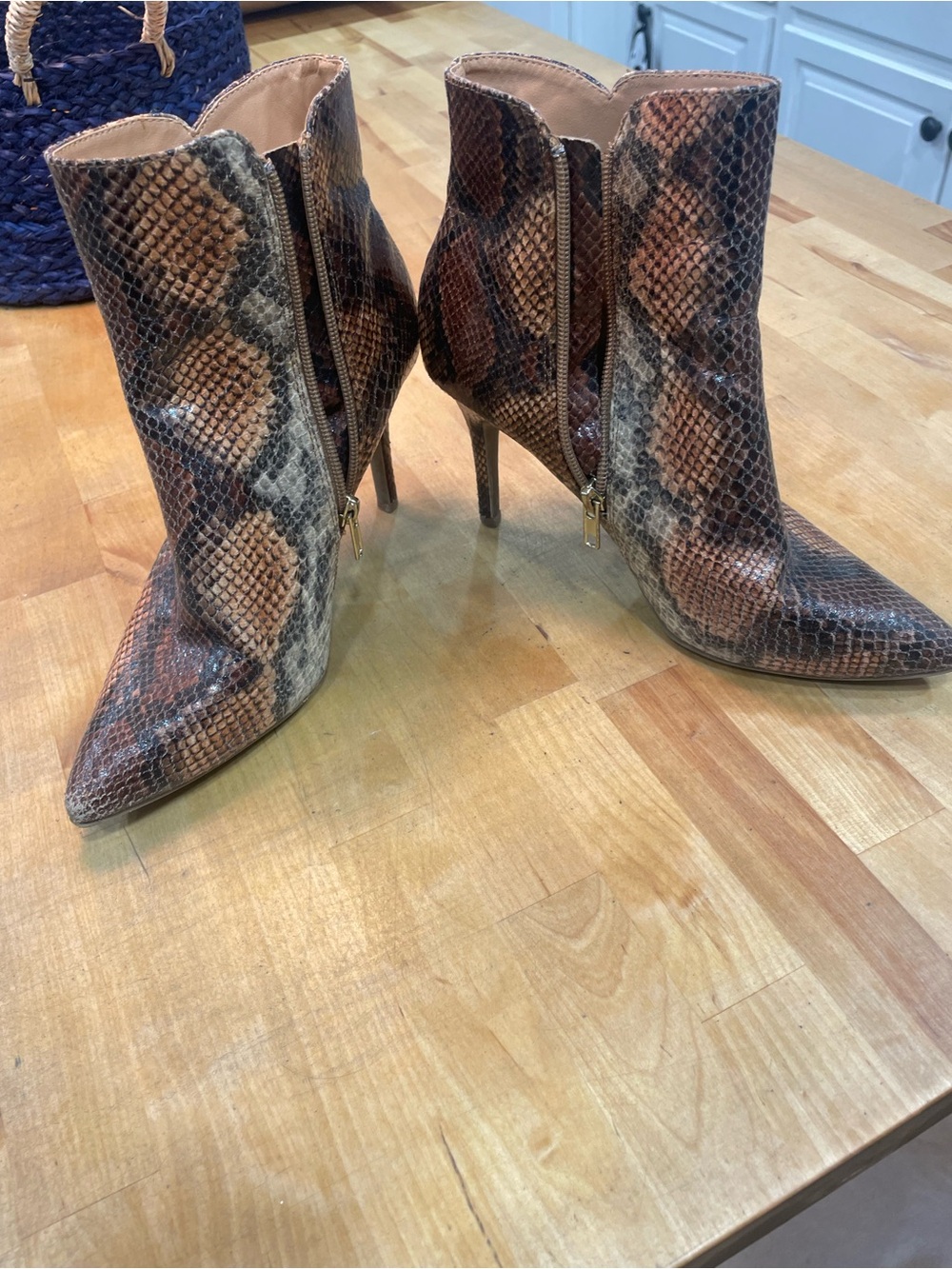 Snake-Print Pointed Toe Ankle Booties in Brown
